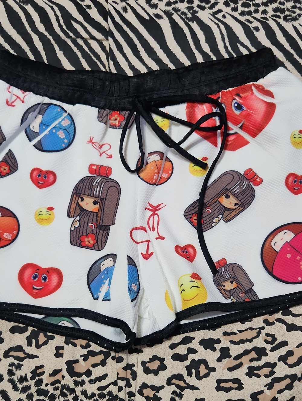 Topia White Athletic Shorts with Emoji and Doll Character Graphics